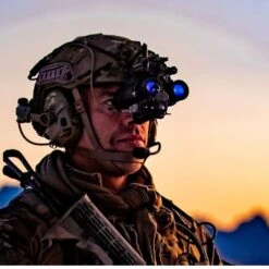 Tactical Equipment -Tactical Equipment A soldier wearing a helmet with Elbit F5032 PVS 31D Night Vision Goggles attached 1