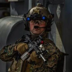 DTNVS-MG | Gen 3 White Phosphor W/ 2700 FOM -Tactical Equipment Soldier in action wearing a helmet with the Act in Black DTNVS MG Binocular attached c8d5a1f8 b0c9 4cd6 a96b c99881d8e8c6