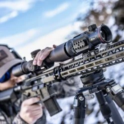 IRay Mate MAH50 | 50mm Clip-On Thermal W/ 2400 Yard Range 31 IRay Mate MAH50 | 50mm Clip-On Thermal W/ 2400 Yard Range -Tactical Equipment gallery image hunter aiming rifle equipped with iray mate mah50