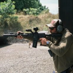 GBRS Group Hydra V2 Mount Kit | Made In USA 19 GBRS Group Hydra V2 Mount Kit | Made In USA -Tactical Equipment man aiming rifle equipped with aimpoint duty rds black gbrs group hydra v2 mount