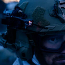 Princeton Tec Charge X| 100 Lumens | 40 Hours -Tactical Equipment operator wears helmet with charge x red led turned on