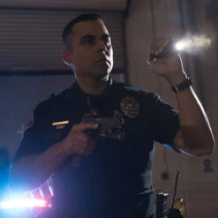 SureFire Stiletto Pro | Rechargeable Pocket Light | 1,000 Lumens 9 SureFire Stiletto Pro | Rechargeable Pocket Light | 1,000 Lumens -Tactical Equipment police officer scanning the area with stiletto pro flashlight gallery